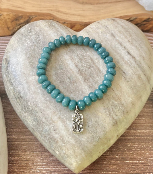 Pewter lotus~ deep teal rondelle