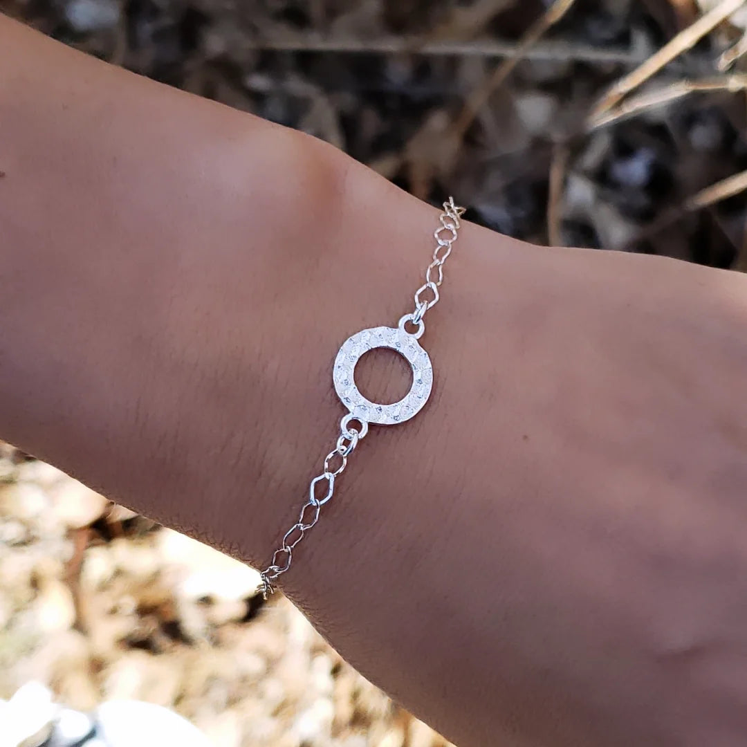Sterling silver hammered circle bracelet